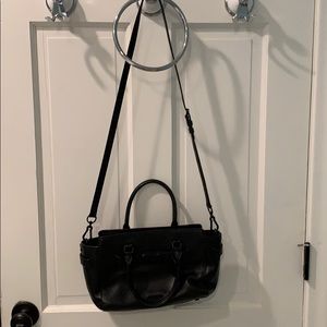 Small Black Coach purse with strap